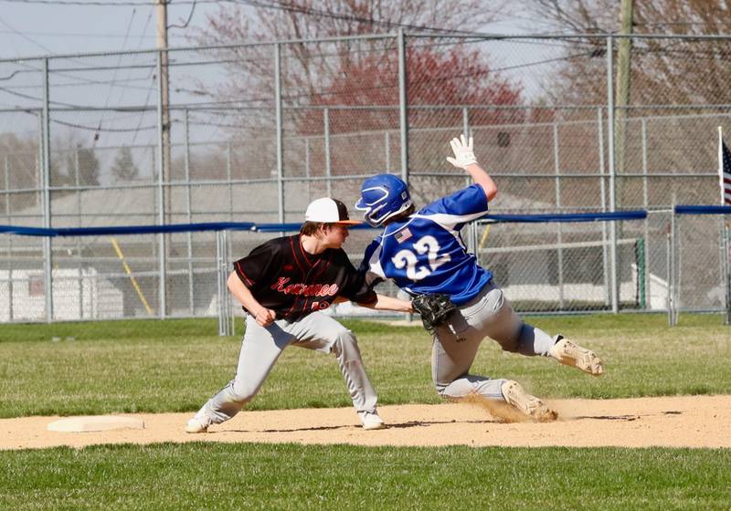 Princeton's Jordan Reinhardt slides into second base Tuesday against Kewanee.