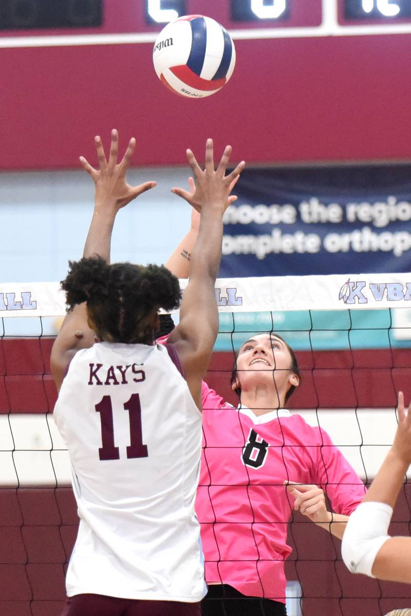 Bradley-Bourbonnais' Hannah Wojnowski, right, looks to hit the ball over Kankakee's Shania Johnson during All-City action at Kankakee Tuesday, Sept. 9, 2025.