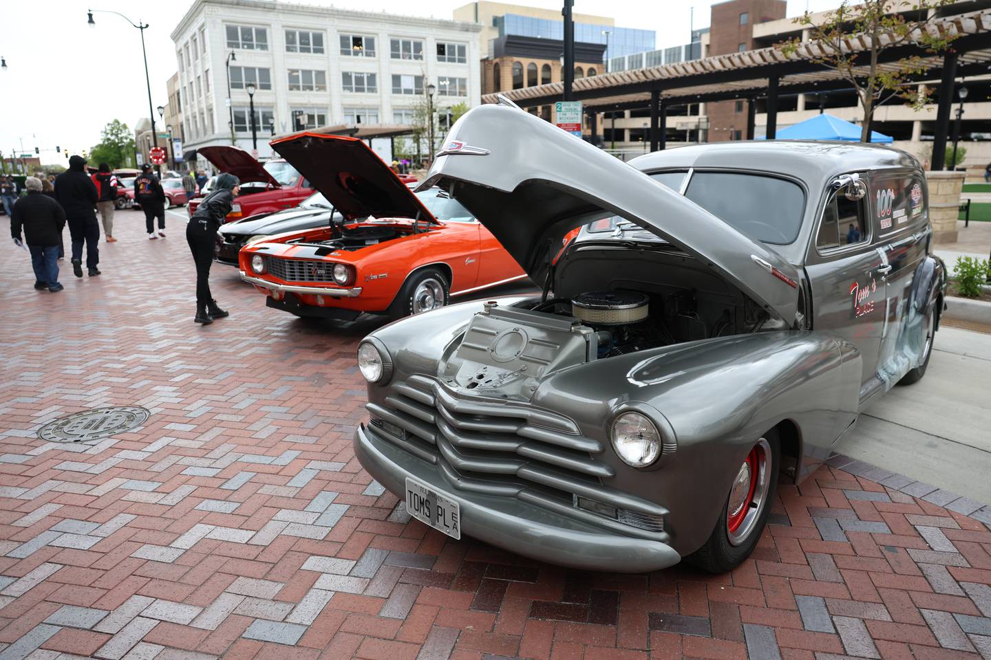 Classic cars on display as part of the car show at the opening of Joliet's City Square downtown on Friday, May 1, 2026.
