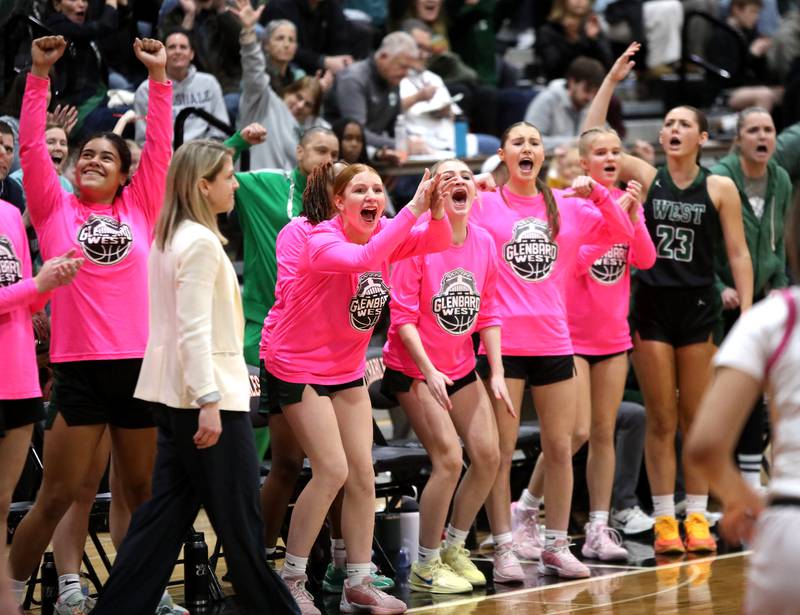 Glenbard West's bench erupts during the Class 4A St. Charles East Sectional final against Batavia on Thursday, Feb. 27, 2025 in St. Charles.