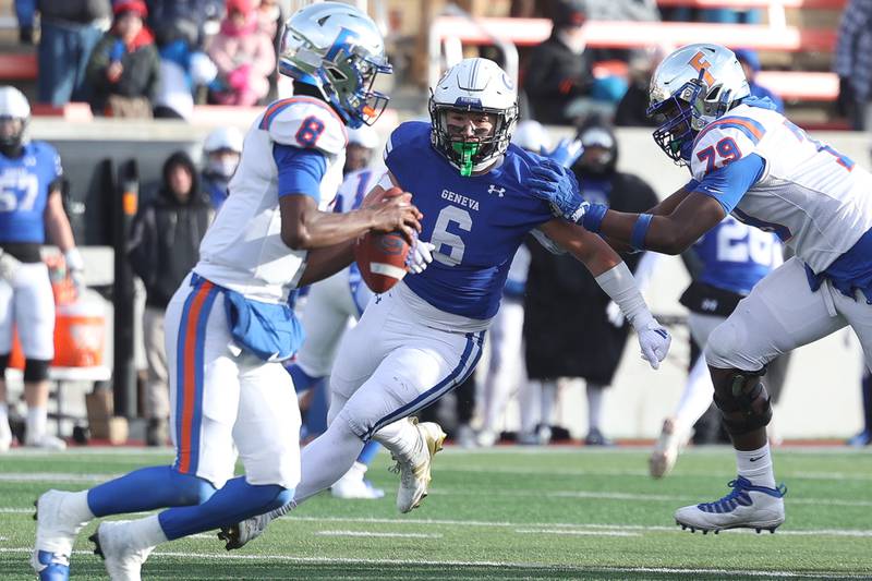 Geneva’s Gavin Burt puts pressure against East St. Louis’ Kendrick Lyons in the Class 6A state championship on Saturday, Nov. 30, 2024 in Normal.