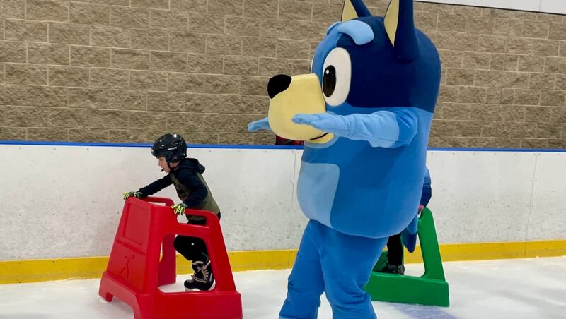 Bluey, the star of the Australian-based cartoon of the same title, glides on the ice Saturday at Ice Valley Centre Ice Arena alongside attendees of Kankakee Valley Park District’s annual Winter Fest.
