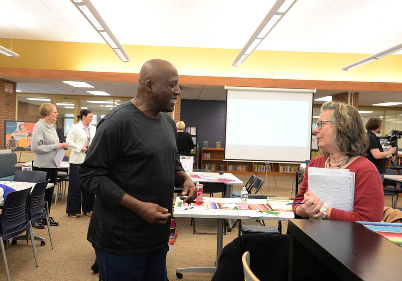 First Baptist Church of LaGrange Pastor Maurice McGee and Leader of the Indivisible Leader Mary Ann Quinlan talk together during a breakout session while attending the Building Inclusive Community Conference held at Lyons Township Saturday, Feb. 8, 2025.