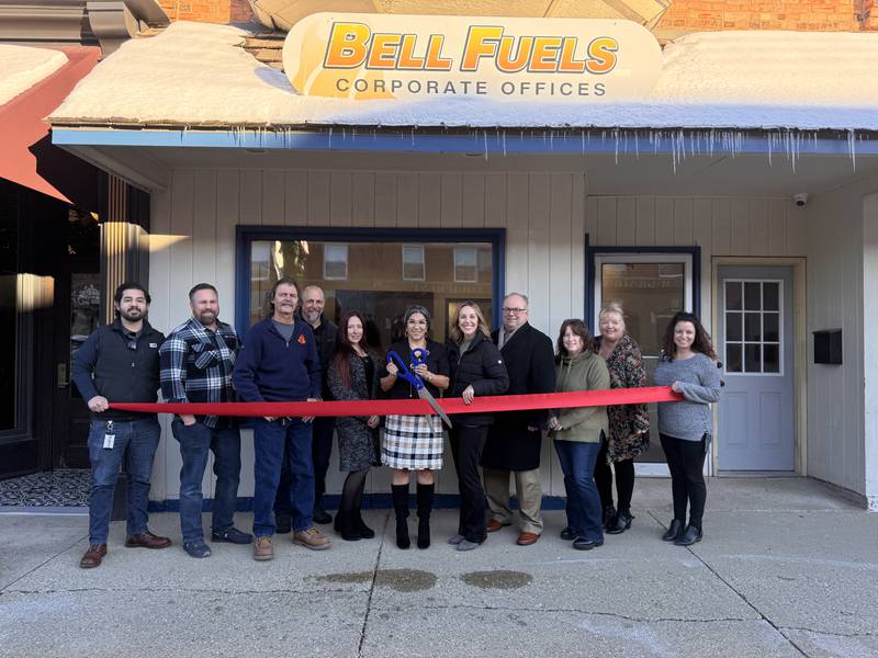 Bell Fuels Owner Stella Gaytan cuts the ribbon at the Grundy County Chamber ribbon cutting on Dec. 8 for their new office in downtown Morris. The Bell Fuels team, City of Morris representatives, Grundy Chamber staff, and Ambassadors all celebrated the new office.
