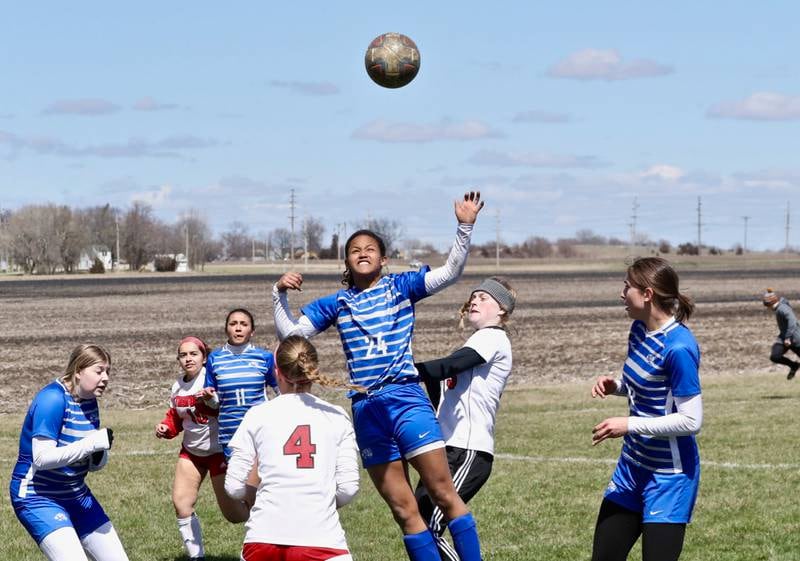 Princeton's Mariah Hobson rises above the crowd for a play on the ball in Saturday's third-place game of the Princeton Invitational vs. Streator.