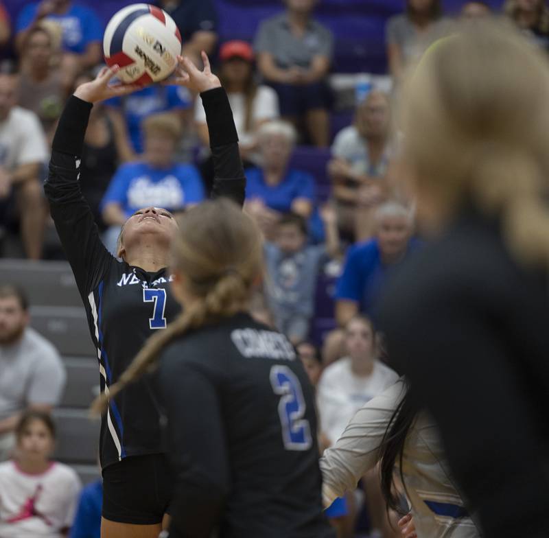 Newman’s Makenzie Duhon sets the ball Monday, August 28, 2023 during a non-conference match-up in Dixon.