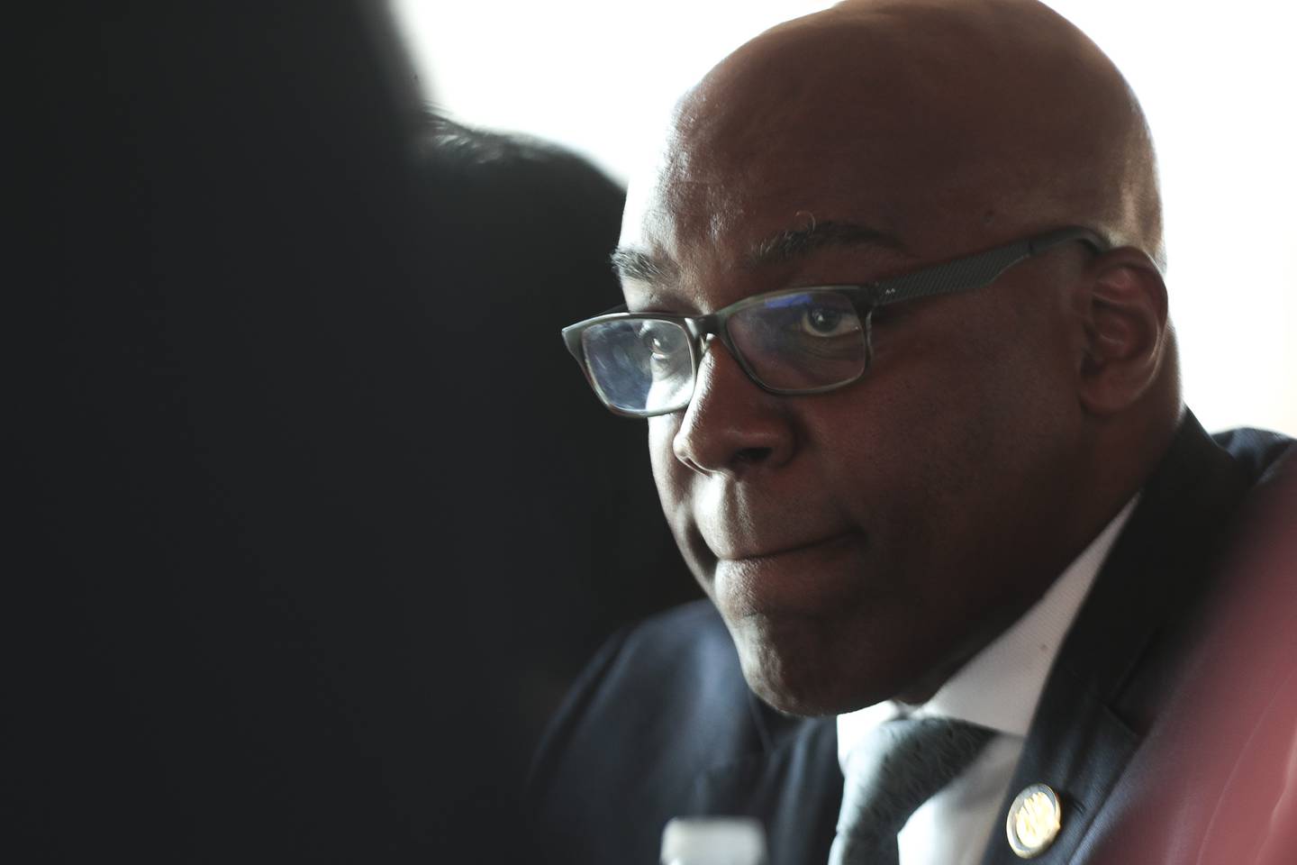 Illinois State Attorney General Kwame Raoul listens to public comment on Wednesday, Sept. 8, 2021, at Joliet Area Historical Museum in Joliet, Ill. Illinois State Attorney General Kwame Raoul and his team held a small meeting with community members after his announcement of a civil investigation into the Joliet Police Department.