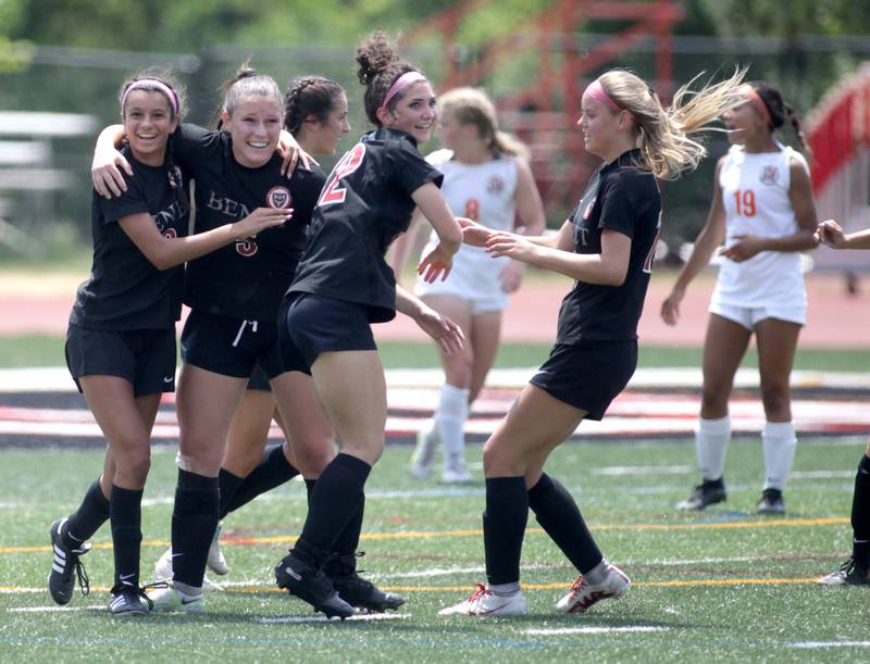 Benet players celebrate a goal by teammate Rania Fikri (far left) during a Class 2A girls state soccer semifinal at North Central College in Naperville on Friday, June 2, 2023.