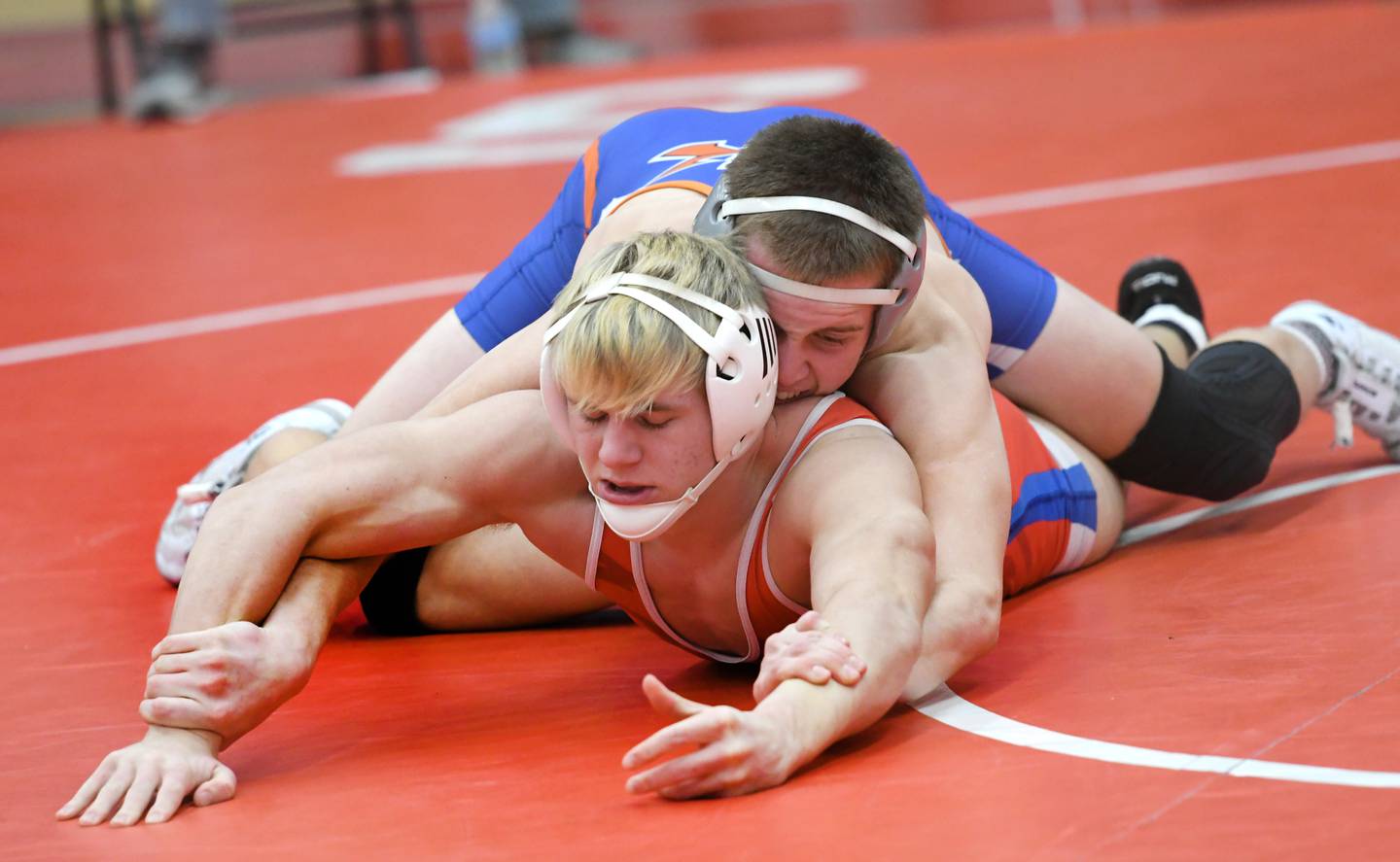 Morrison's Brady Anderson (bottom) wrestles Genoa-Kingston's Brady Brewick in their 152-pound match at the 1A Oregon Wrestling Sectional on Friday night.