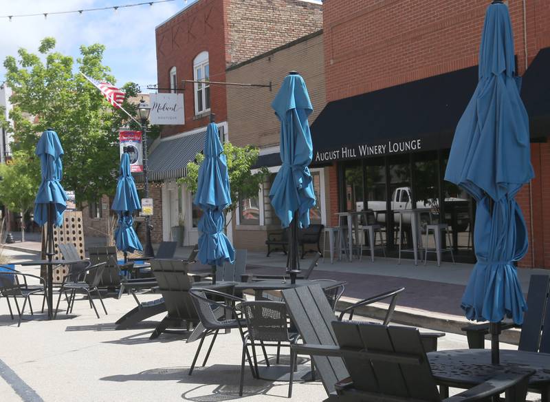 Outdoor dining is being set up on Mill Street on Tuesday, May 7, 2024 downtown Utica. Mill Street has been closed to motorists once again as tables, chairs and other patio furniture can be placed for the outdoor dining experience.