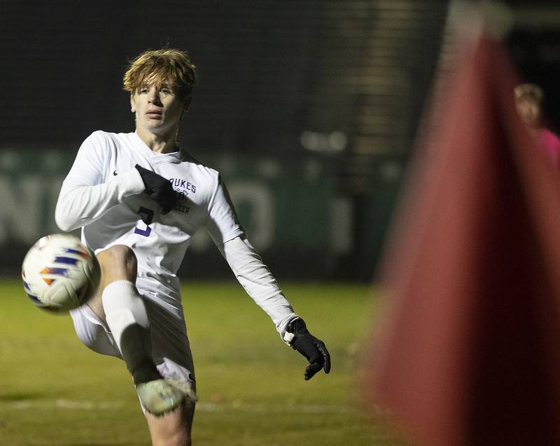 Dixon’s Dylan Osmer handles the ball against Geneseo Wednesday, Oct. 23, 2024, during the class 2A soccer regional in Geneseo.