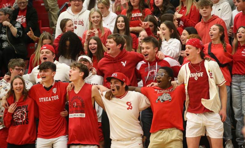 Streator super fans cheer on the Bulldogs as they play L-P during the Class 3A Regional title game on Friday, Feb. 28, 2025 in Sellett Gymnasium at L-P High School.