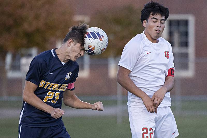 Sterling’s Carter Chance heads the ball against Lasalle-Peru’s Antonio Martinez Tuesday, Oct. 17, 2023 in a regional semifinal in Sterling.