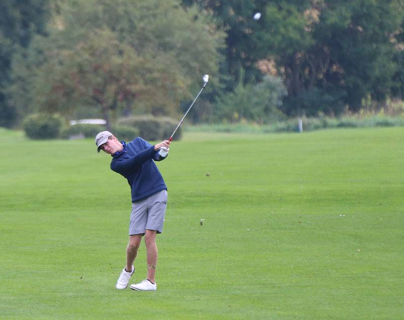 Newman's Logan Palmer swings away during the Three Rivers Athletic Conference boys varsity tournament on Tuesday, Sept. 19, 2023 at Mendota Golf Club.