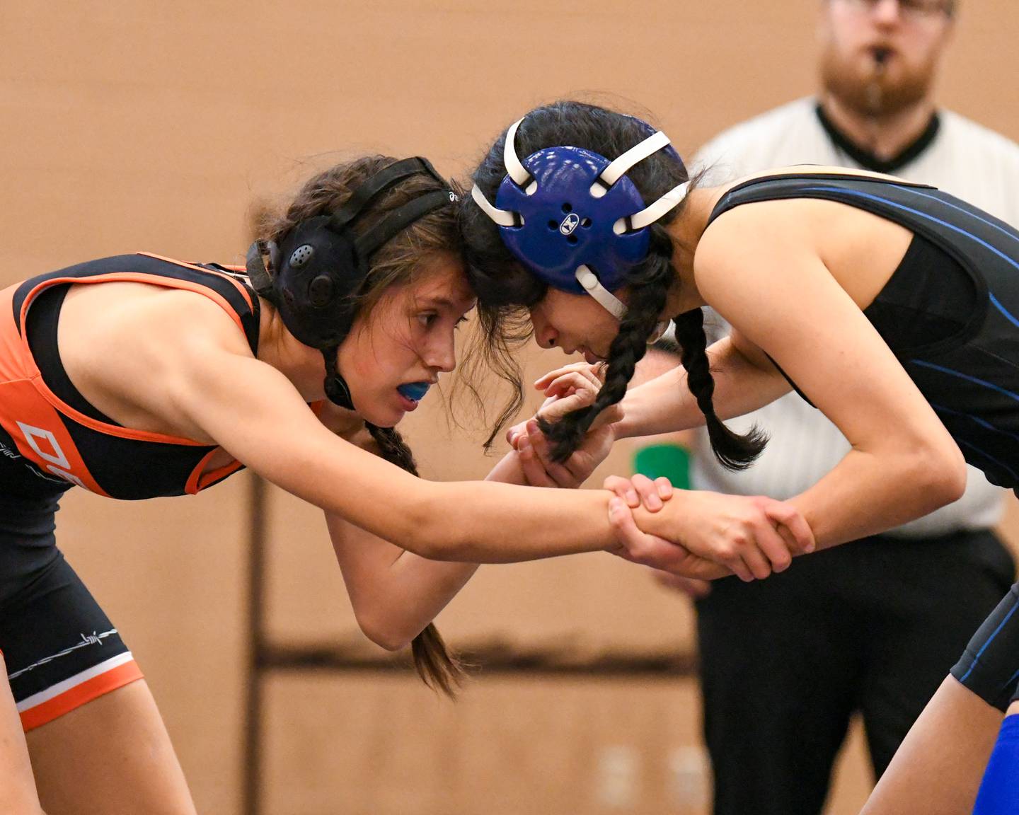 DeKalb’s Frieda Hernandez, left, wrestles agents Dundee Crown Leslie Figuera during the quad meet in the 105 weight class on Saturday Nov. 22, 2023, held at DeKalb High School.