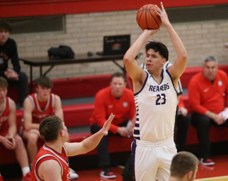 Plano's Isiah Martinez shoots a jump shot over Streator's Nolan Lukach during the Dean Riley Shootin' The Rock Thanksgiving Tournament on Monday, Nov. 20, 2023 at Kingman Gym.