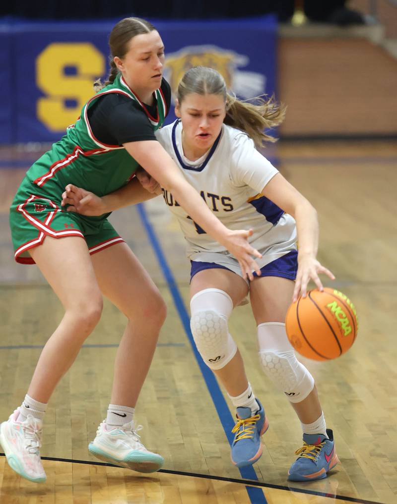 Somonauk-Leland's Kiley Mason tries to hold off La Salle-Peru's Alexus Hines during their game Thursday, Nov. 20, 2025, in the Tim Humes Breakout girls basketball tournament at Somonauk High School.