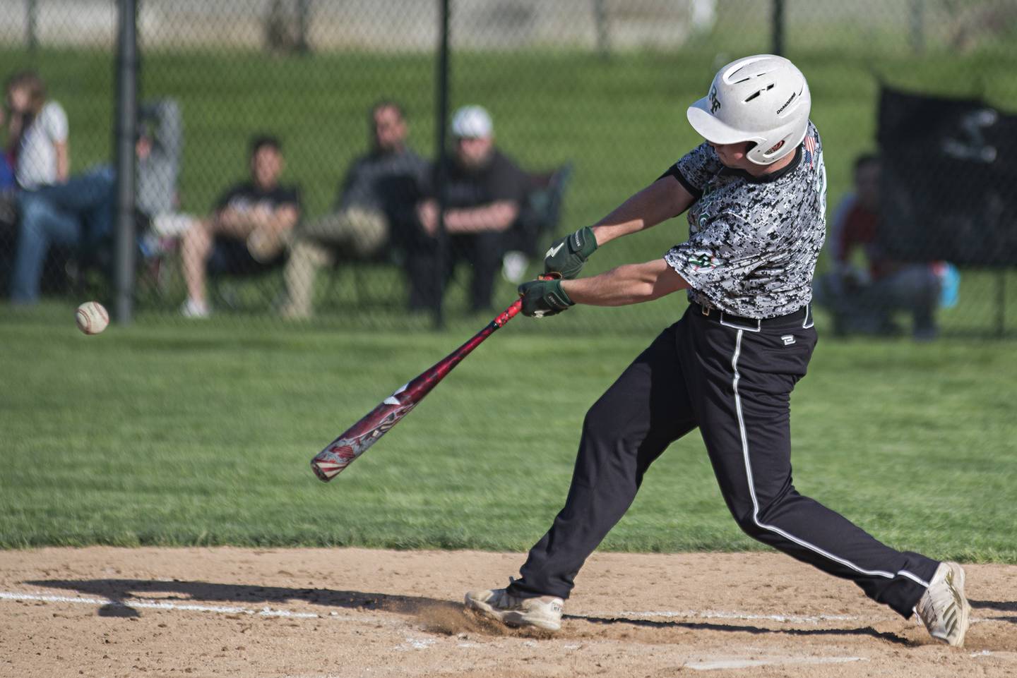 Rock Falls’ Brady Richards drives in a run Monday, May 16, 2022 against Oregon in the IHSA baseball quarterfinals.