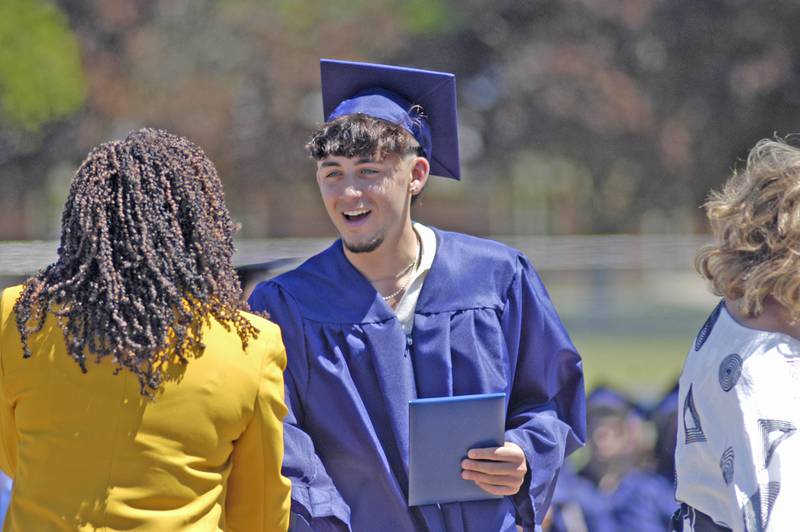Nico Battaglia recieves his dipolma.  The Sterling Class of 2025 Commencement Ceremony was held on Sunday, May 18, 2025 at Roscoe Eades Field in Sterling.