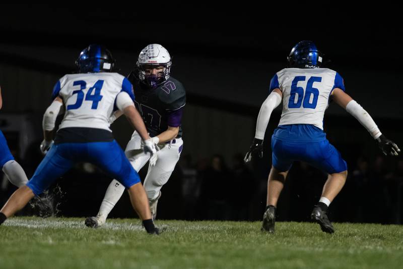 Wilmington's Nate Cupples goes for the ball during the Wildcats' 49-7 victory over Tri-Valley in the quarterfinal game on Saturday, Nov. 15, 2025.