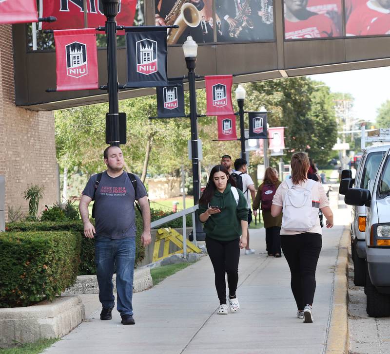 Northern Illinois University students move between classes Wednesday, Aug. 24, 2022, on campus at NIU in DeKalb.