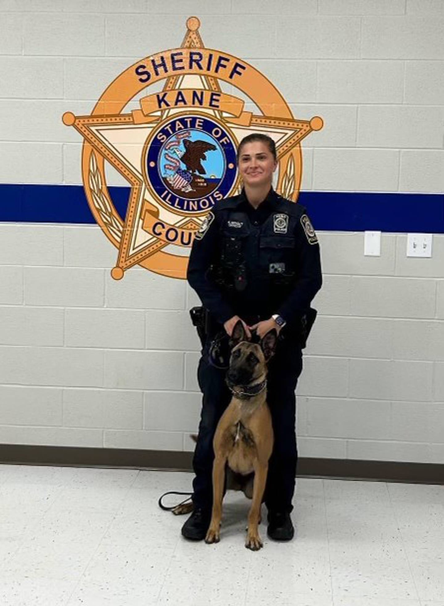 K-9 Ny with her handler Officer Hunter Wright.