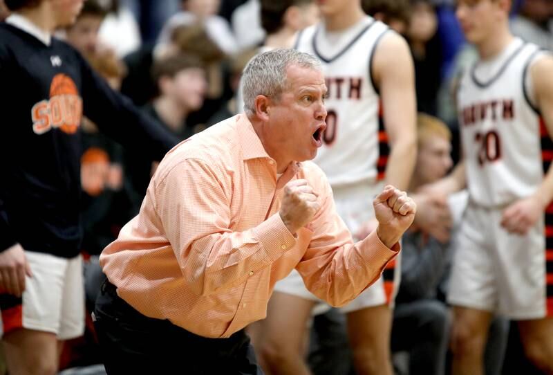 Wheaton Warrenville South's head coach Mike Healy yells to his team during a game against Wheaton North on Friday, Feb. 7, 2025 in Wheaton.