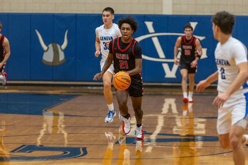 Batavia's Xavier Justice dribbles up court against Geneva  on Friday, Dec.19,2025 in Geneva.