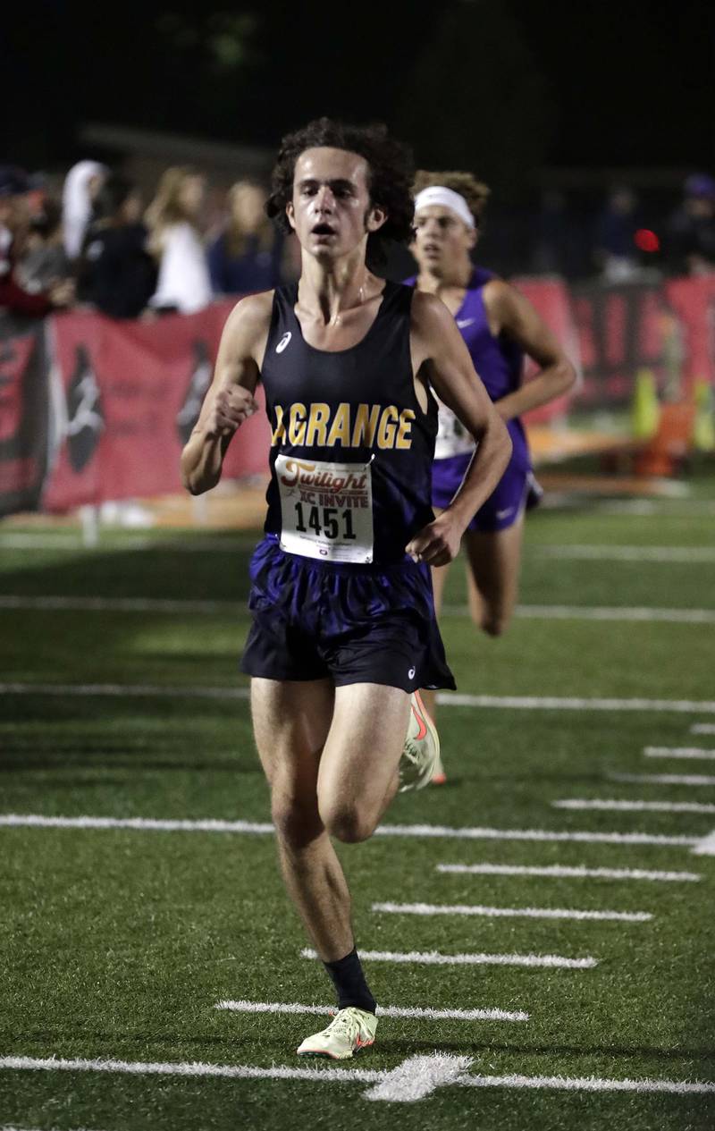 Photos Naperville North's Twilight Invitational cross country meet
