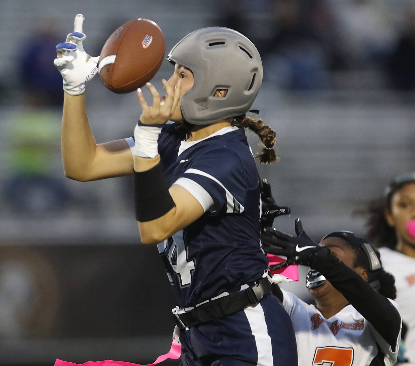Cary-Grove's Aria Stanton catches a pass during an IHSA McHenry Sectional semifinal girls flag football game against Harlem on Monday, Oct. 13, 2025, at McCracken Field in McHenry.