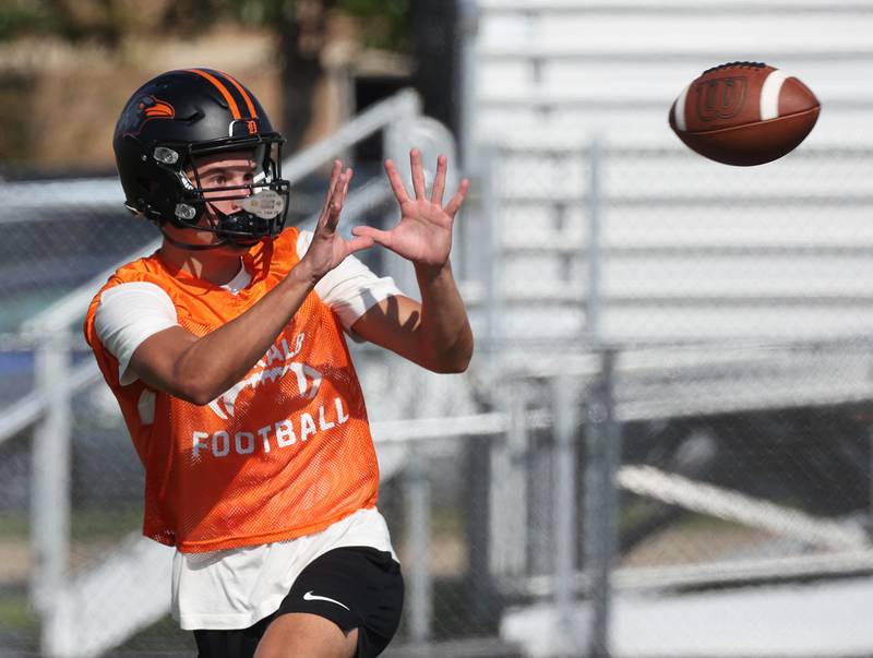 DeKalb’s Jack Rosenow makes a catch Monday, Aug. 11, 2025, during their first fall practice at the school.