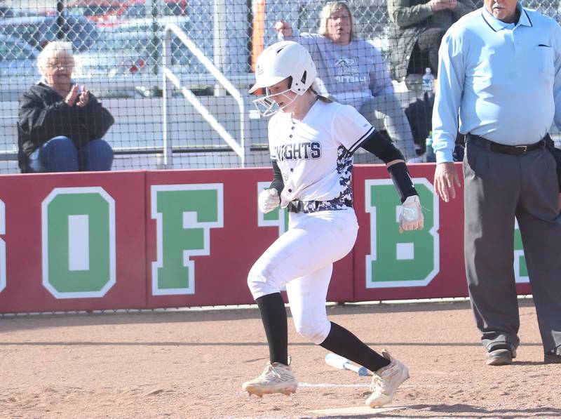 Kaneland's Natalie Naab scores the teams first run against L-P on Wednesday, April 2024 at the L-P Athletic Complex in La Salle.