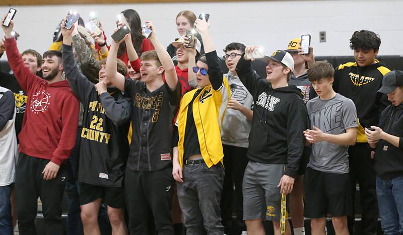 Putnam County superfans cheer on the Lady Panthers in the closing minute as they defeated Midland during the Class 1A Regional game on Monday, Feb. 13, 2023 at Putnam County High School.