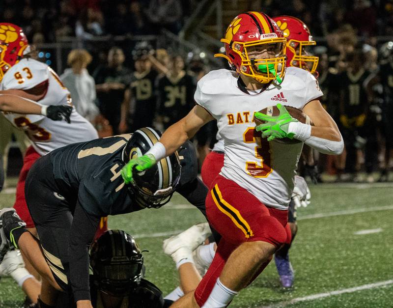 Batavia's Ryan Whitwell (3) carries the ball against Glenbard North during a football game at Glenbard North High School in Carol Stream on Friday, Sep 23, 2022.