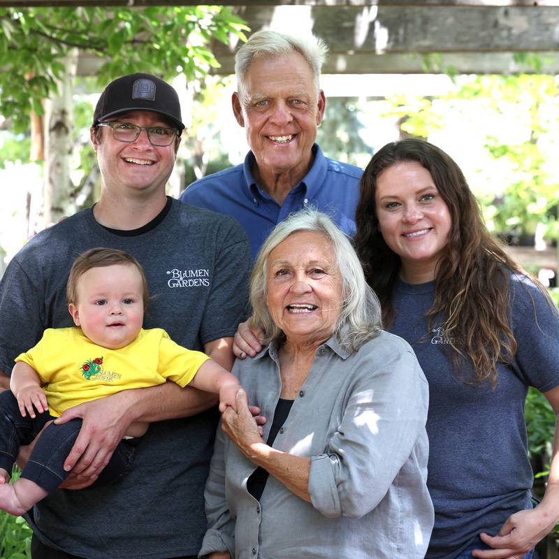 Joel Barczak (clockwise from top) co-owner of Blumen Gardens, with his daughter Jill Mandeville, co-owner, wife Joan Barczak, co-owner, grandson Clay Mandeville and son-in-law Keith Mandeville, manager, Wednesday, June 19, 2024, in the shade garden area at the store in Sycamore.