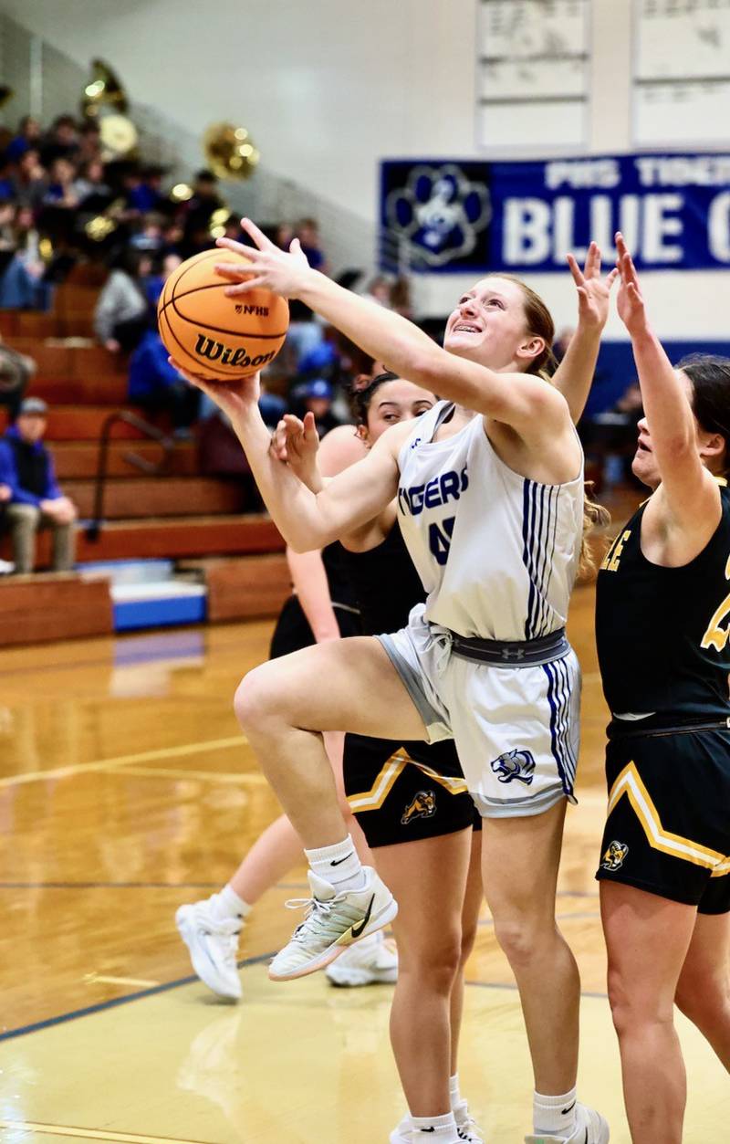 Princeton's Jocelyn Strouss takes in a layup against Riverdale Tuesday night at Prouty Gym.