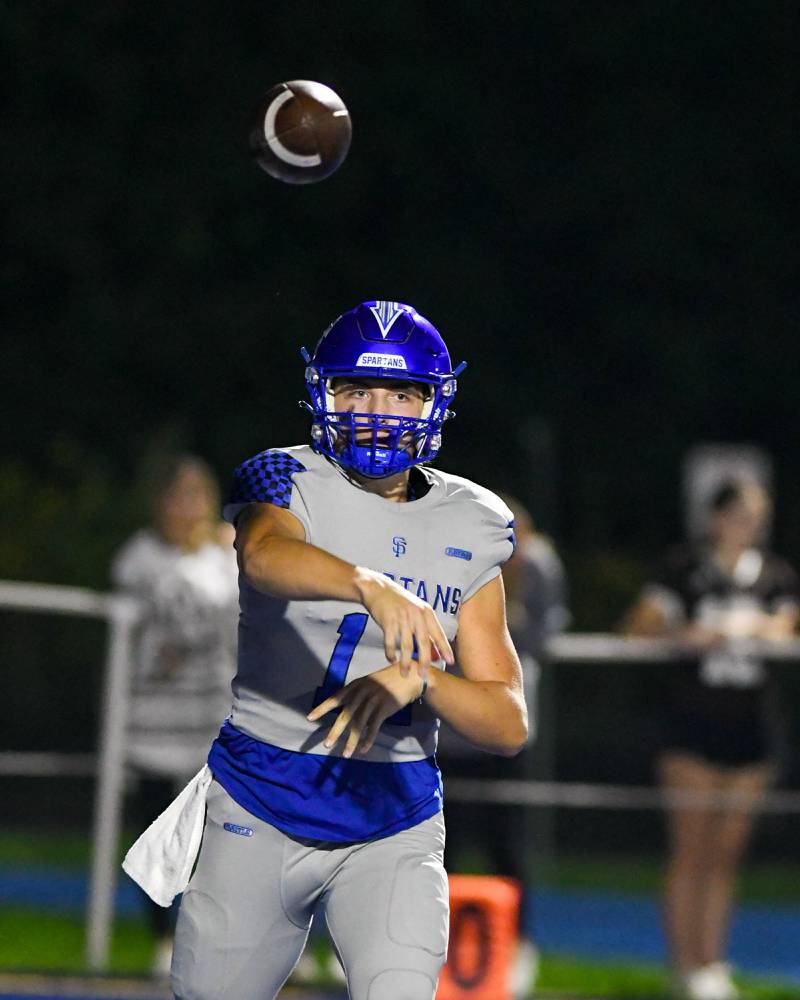St. Francis’ Alessio Milivojevic (11) throws a pass that was caught in the first quarter against Joliet Catholic on Friday Sept. 22, 2023, at St. Francis in Wheaton,.