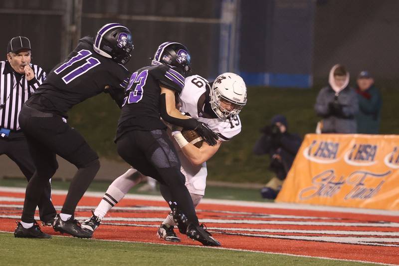 Mt. Carmel’s Kevin Gardner powers into the end zone after a catch against Downers Grove North in the Class 7A championship on Saturday, Nov. 25, 2023 at Hancock Stadium in Normal.