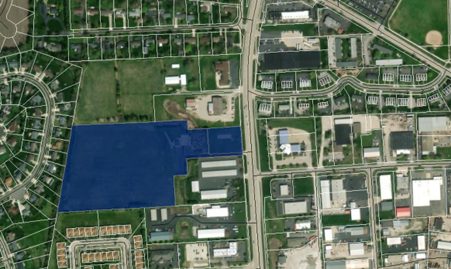 Fox Haven, a proposed town home development with 18 buildings and 105 dwelling units, will be located at 115 South Bridge Street if the project receives city approval.