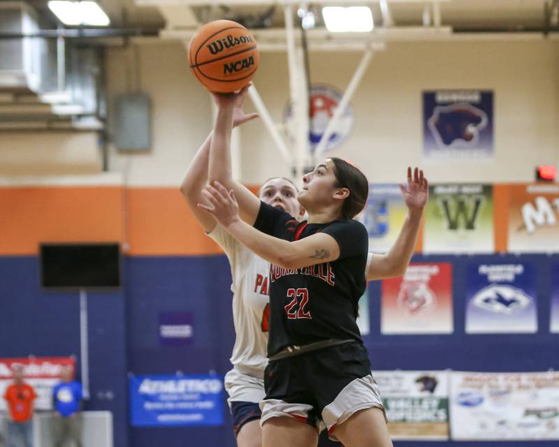 Yorkville's Sydney McCabe (22) puts up a shot at the rim during their basketball game between Yorkville at Oswego, Feb 7, 2026 in Oswego.