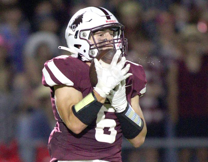 Prairie Ridge’s Luke Vanderwiel reels in an interception against Huntley in varsity football at Crystal Lake Friday night.