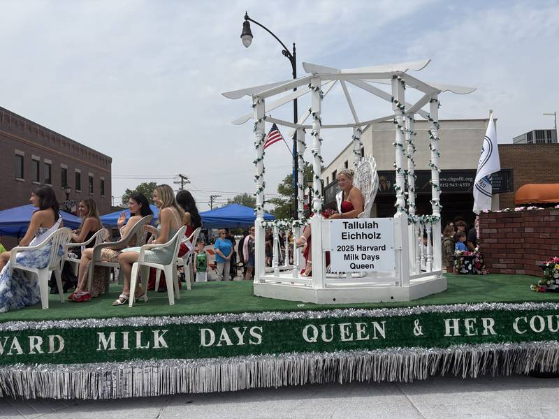 Harvard Milk Days queen Tallulah Eichholz and her court participate in the Harvard Milk Days parade June 7, 2025.