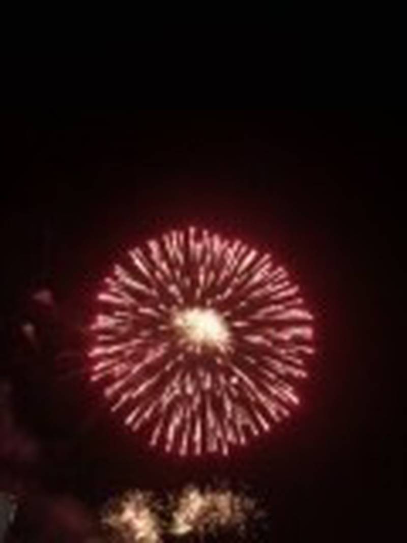 Fireworks over Lily Lake during Lakemoor Fest' Fireworks show Saturday night. Pyrotechnicians released about 33,000 fireworks during the show.