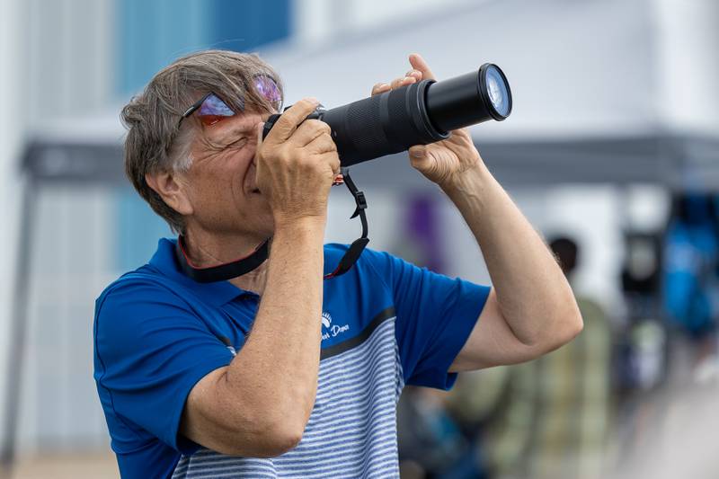 Glenn Guminski takes photos as planes look to take off beating state record of most jumpers in formation on Wednesday, Aug 20, 2025 at Skydive Chicago in Ottawa.