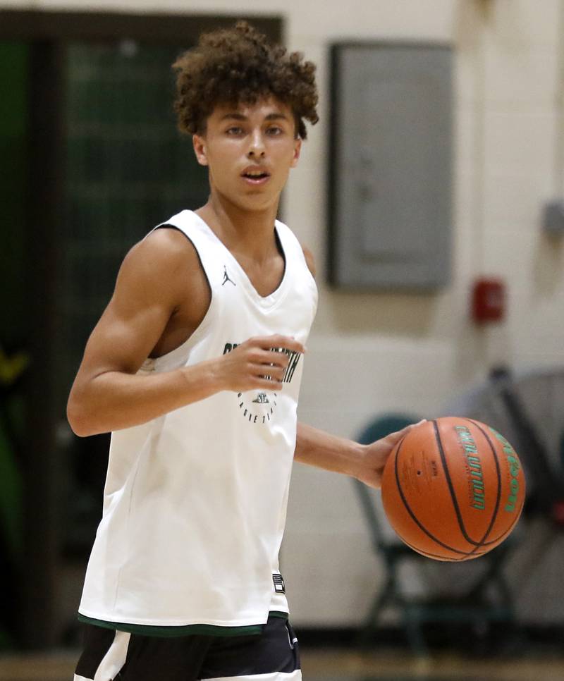 Crystal Lake South's AJ Demirov brings the ball up the court during a game against Lakes Friday, June 23, 2023, in the Crystal Lake South Gary Collins Shootout, at the high school in Crystal Lake.