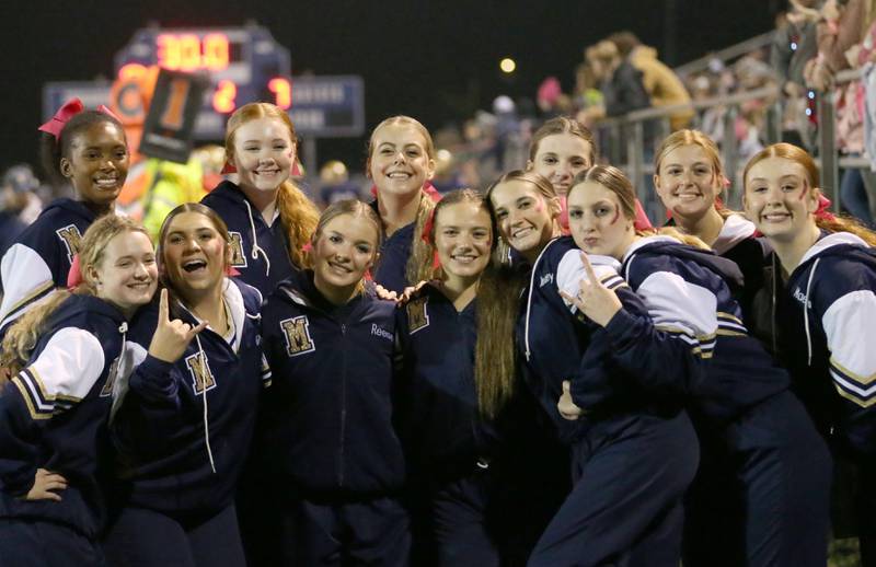 Marquette cheerleaders pose for a photo on Friday, Oct. 13, 2023 at Gould Stadium.