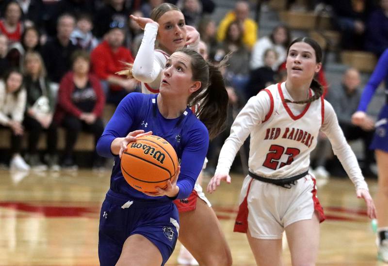 Lake Zurich’s  Layne Nordstrom heads for the hoop in IHSA Class 4A Sectional girls basketball action on Tuesday, Feb. 25, 2025, at Huntley High School in Huntley.