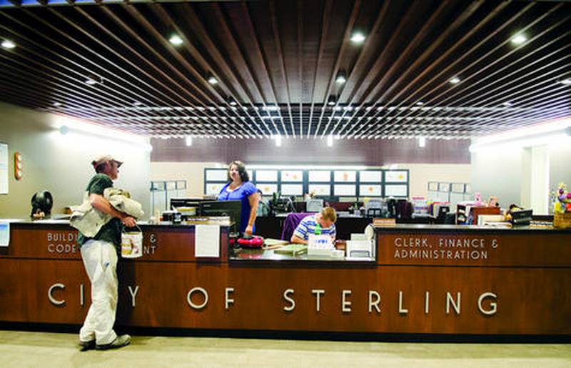 The renovated Sterling Coliseum has a centralized reception desk. Instead of running people to different floors for city services, there now is one desk "where all your questions are going to get answered," City Manager Scott Shumard said.