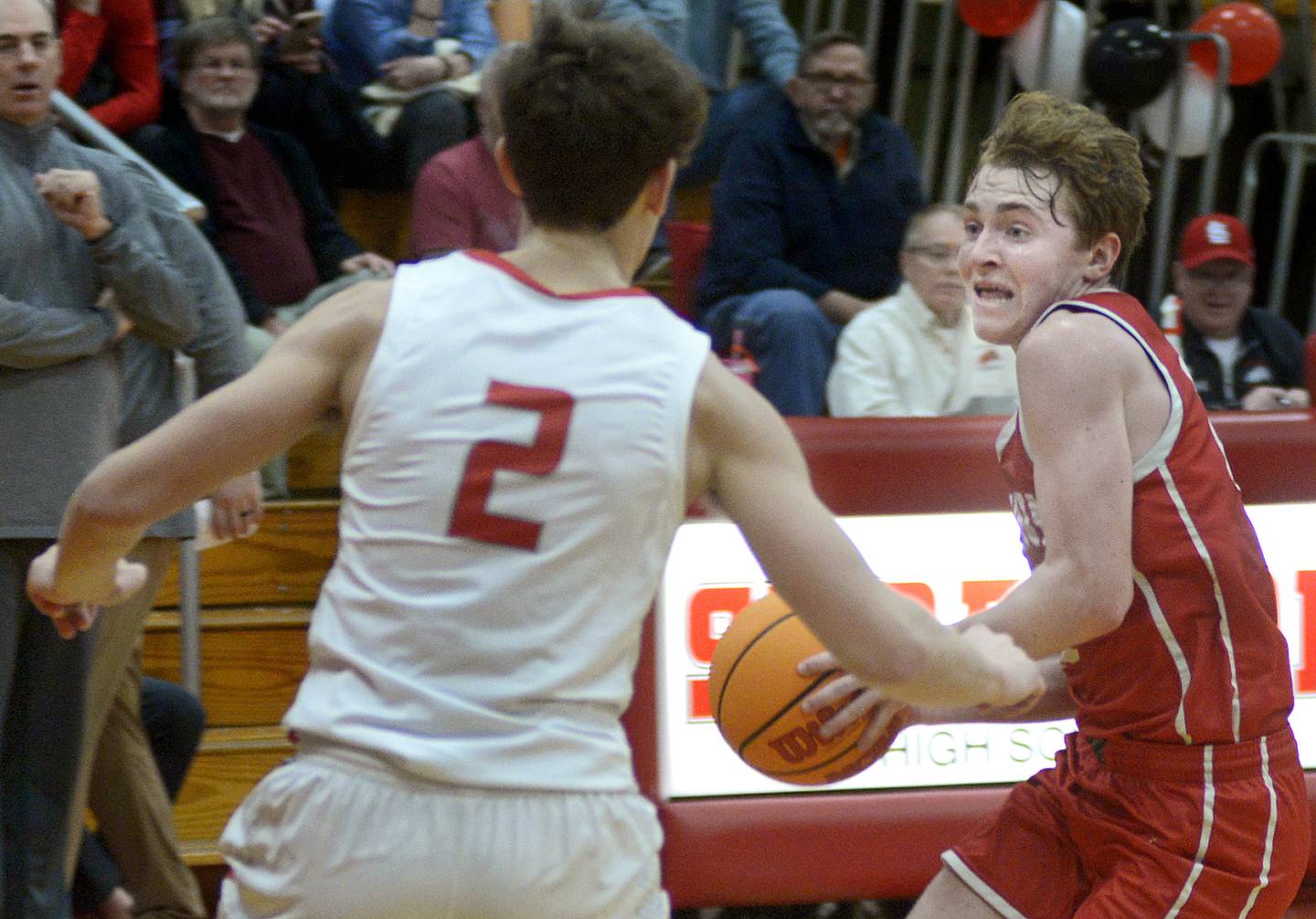 Ottawa’s Evan Snook works to get past Streator’s Matt Williamson (2) in the second quarter Saturday, Feb. 15, 2025, in Streator.