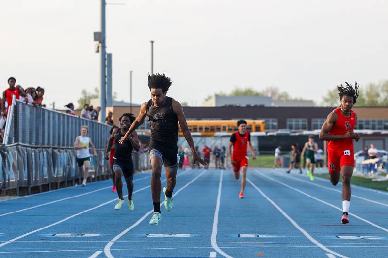 Kankakee's Phillip Turner crosses the finish in first place in the boys 400 meters during the All-City meet at Kankakee High School on Monday, April, 28, 2025.